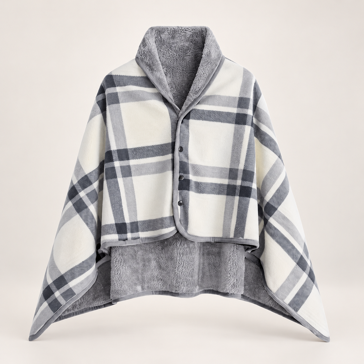 Women's buttoned wrap shawl on a light neutral background