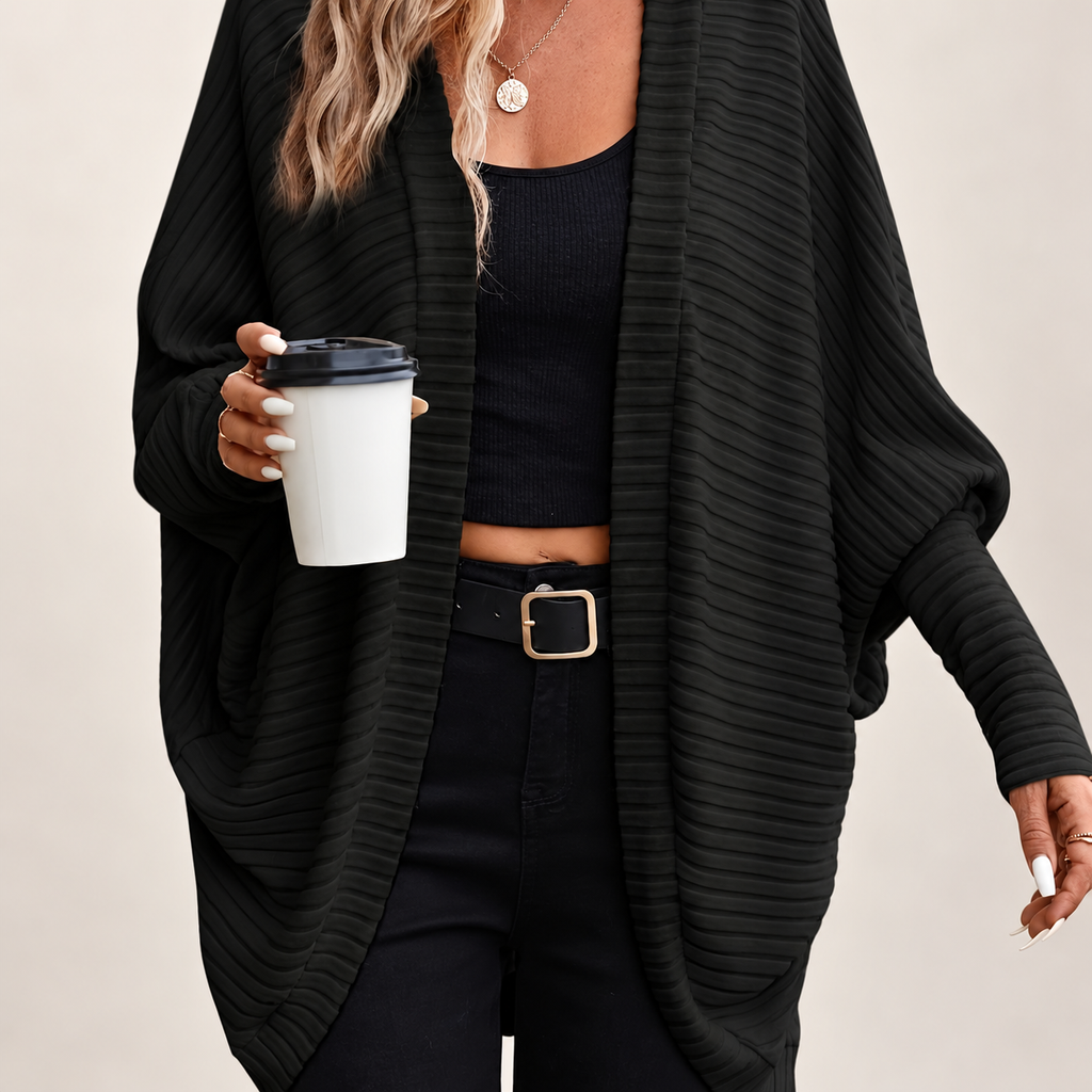 Women's relaxed open-front cardigan on a light neutral background