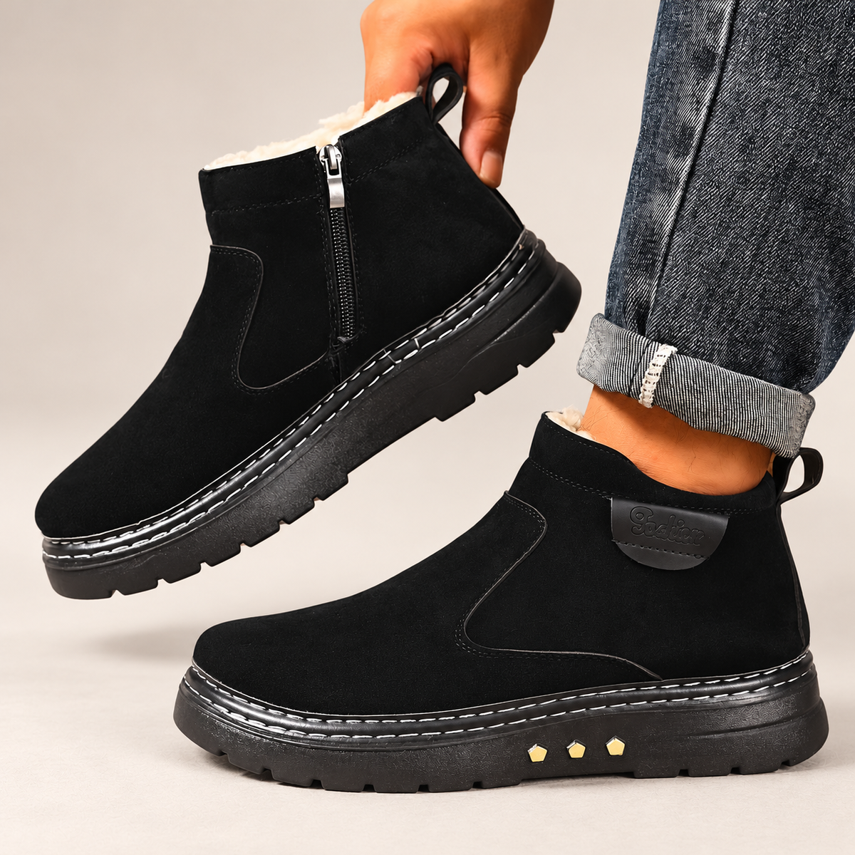 Men's cosy everyday ankle boots on a light neutral background