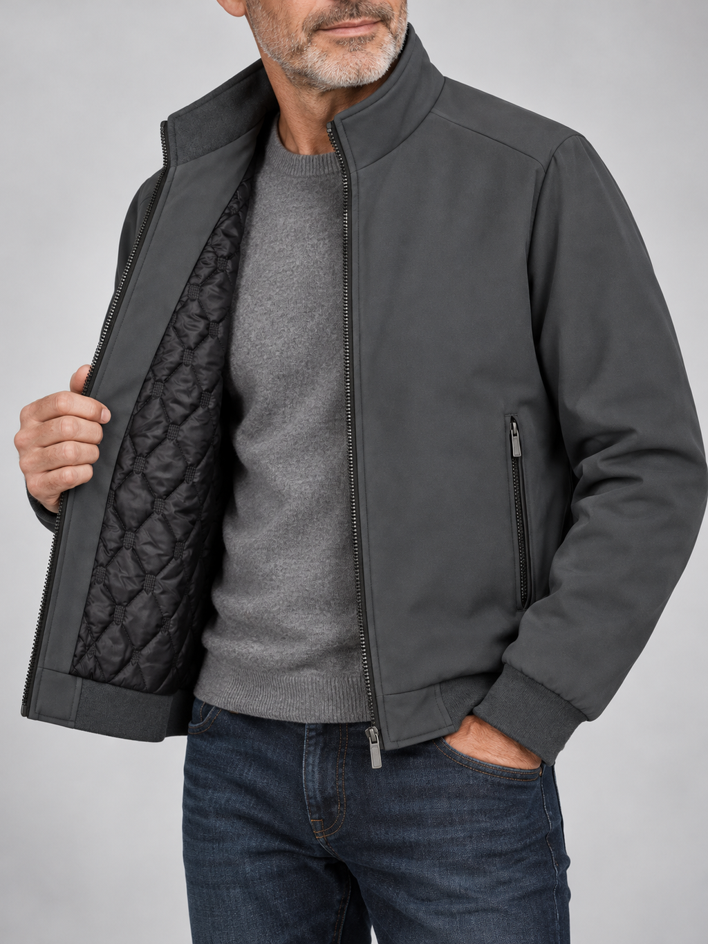 Older male model wearing a charcoal jacket with quilted lining