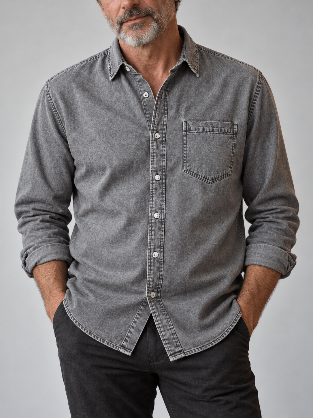 Older male model wearing a grey washed denim shirt