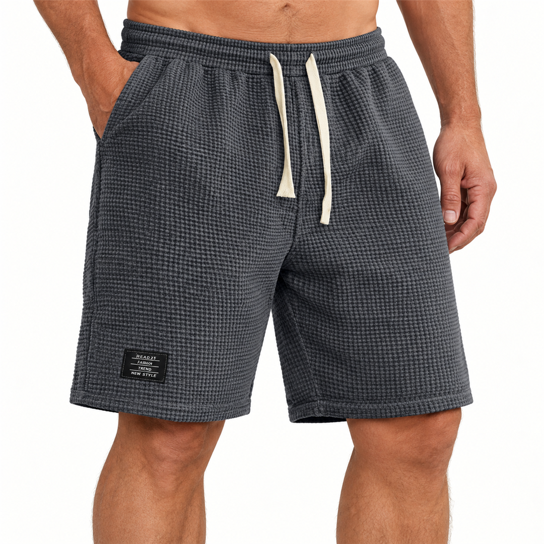 Steven dark grey waffle shorts on a mature man