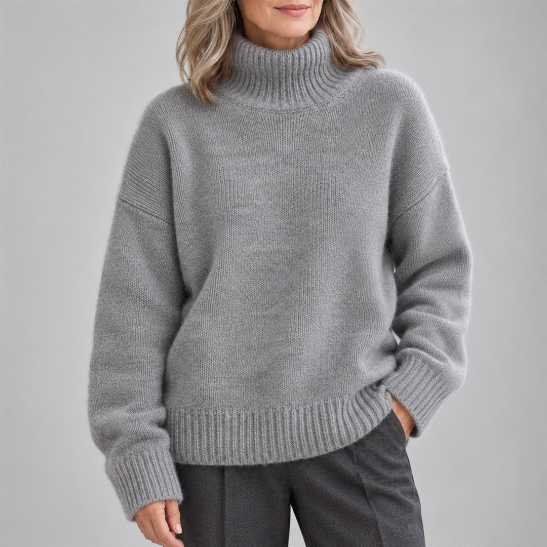 Women's Turtleneck Sweater - Ribbed Oversized Knit worn by an older model against a light grey background